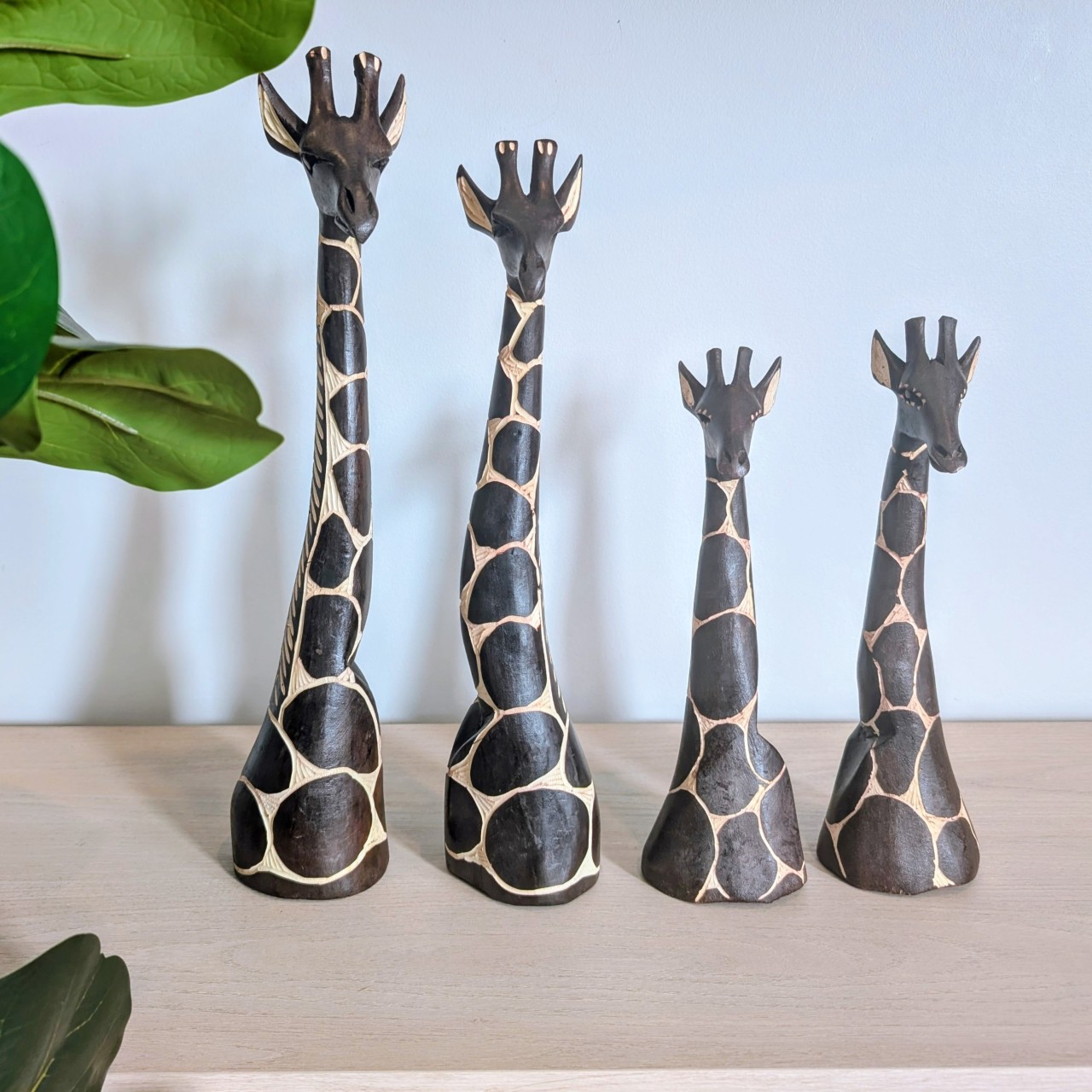 Wooden carved giraffe head and neck