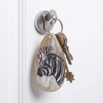 Zebra scrimshawed bone keychain handcraft from Zimbabwe