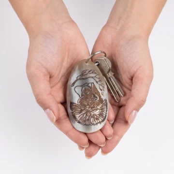 Lion scrimshawed bone keychain handcraft from Zimbabwe