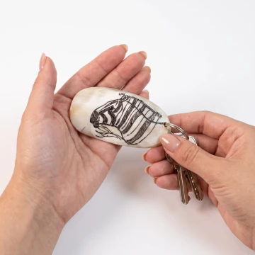 Zebra scrimshawed bone keychain handcraft from Zimbabwe