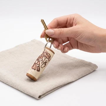 Giraffe scrimshawed keychain made from wood and cow bone