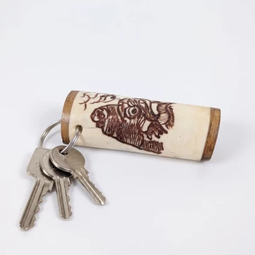 Buffalo scrimshawed keychain made from wood and cow bone