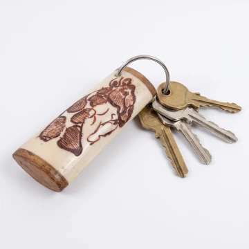 Giraffe scrimshawed keychain made from wood and cow bone