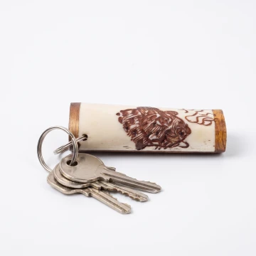 Leopard scrimshawed keychain made from wood and cow bone