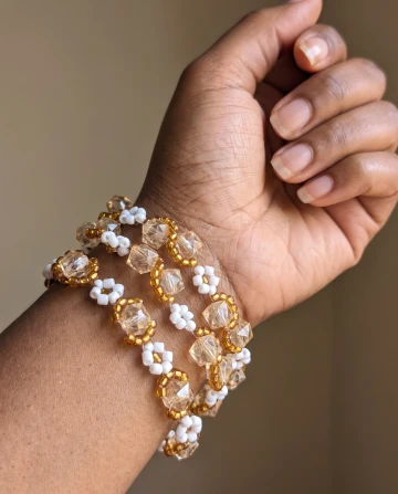 White flower with pink crystals bead bracelet